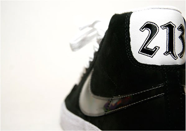 shoes nike blazers. The shoe also features 213 on