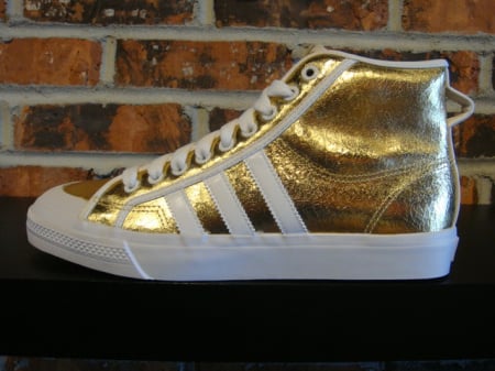 High Tops Gold. on the high-top sneaker.