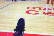 Celebrity Sneaker Watch: Wale Sits Courtside in Air Jordan 4 ‘Bred’