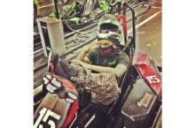 Celebrity Sneaker Watch: Wale Races Tears Up The Track in Air Jordan XIII (13) ‘Black/Varsity Red-White’