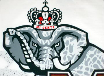 Suck My Kicks Mi Gente Varsity T-Shirts