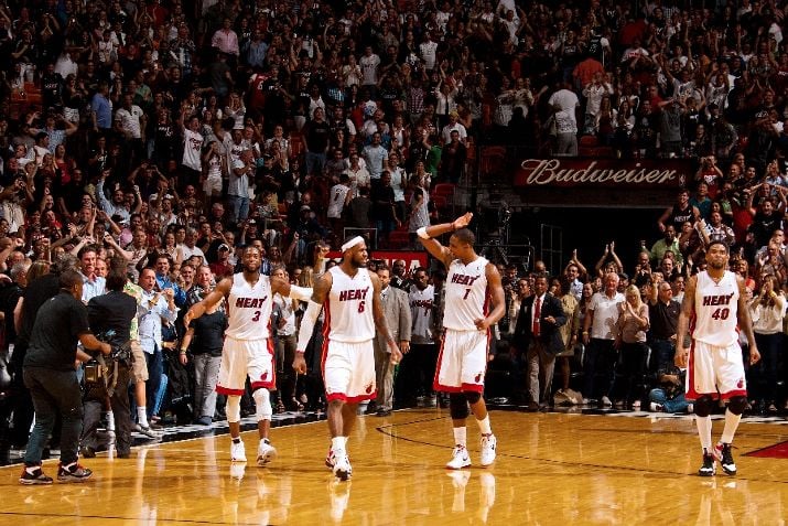 Dwyane Wade Dons 'White/Varsity Red-Black' Air Jordan XIV in OT Win