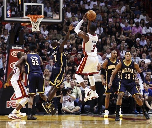 Dwyane Wade Dons 'White/Varsity Red-Black' Air Jordan XIV in OT Win