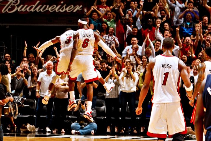 Dwyane Wade Dons 'White/Varsity Red-Black' Air Jordan XIV in OT Win