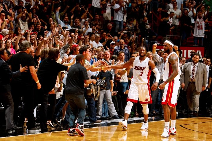 Dwyane Wade Dons 'White/Varsity Red-Black' Air Jordan XIV in OT Win