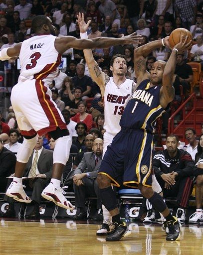 Dwyane Wade Dons 'White/Varsity Red-Black' Air Jordan XIV in OT Win