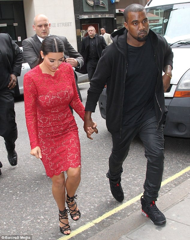 Kanye in the ‘Infrared’ Air Jordan 6 Alongside Kim Kardashian