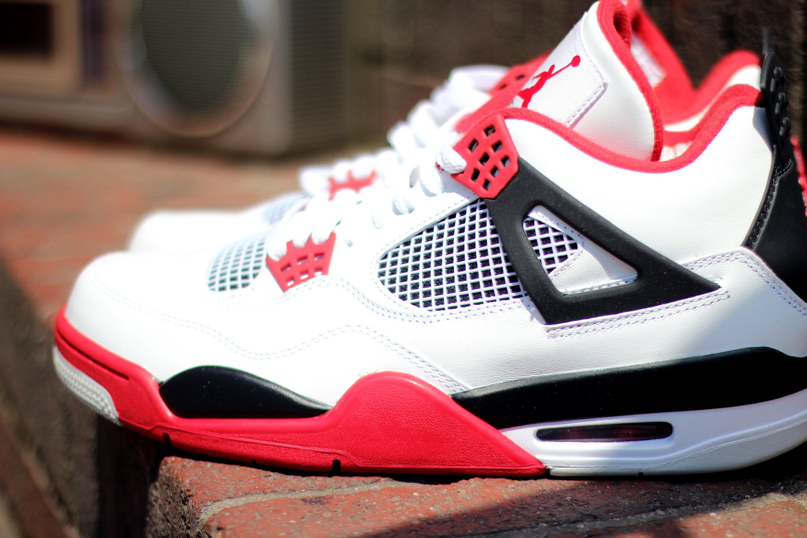 Air Jordan 4 'Fire Red' at Social Status