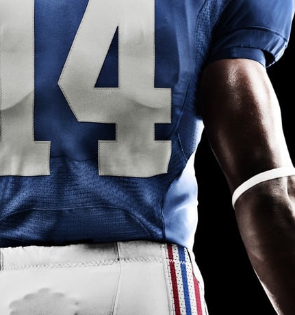 Tonight the NY Giants and Dallas Cowboys will take the field for the NFL season opener wearing Nike’s next-generation NFL uniforms. The NFL Nike Elite 51 Uniform is the most innovative NFL uniform to ever hit the field, delivering superior lightweight performance in a fully integrated system of dress for athletes at the highest level. This uniquely engineered chassis and baselayer combination provides everything an athlete needs and nothing he doesn’t need. Rooted in body-led design, the uniform system is built for a body-contoured fit resulting in zero distractions in order to help amplify speed.  In addition to the new fabrication, teams chose varying levels of design changes reflecting their unique heritage. Both the Giants and the Cowboys have chosen to keep their traditional design aesthetic; however, the Giants stepped into both the new jersey and pant fabrication while the Cowboys have chosen to wear the new jersey threads and keep their former pant fabrication. They’ve also consolidated several colors of blue in the uniform to one distinct hue.  As a player, Nike’s co-founder Bill Bowerman wore the number 51, and after serving in the 10th Mountain Division in WWII he understood the importance of a uniform in battle. Lightweight mattered, as did movement and strength. As a coach, Bowerman knew that extra ounces added up and less weight meant increased mobility and speed.  What Bowerman started, Nike continues to perfect, crafting a fully integrated system of dress where the athlete’s baselayer works in concert with his entire uniform – true innovation from the inside out. Lightweight padding is integrated directly into the crucial “hit zones” in the baselayer. New innovations include integrating Flywire technology into the neckline to reduce weight and provide lockdown fit over pads, increasing sleeve articulation for better range of motion, and integrating new four-way stretch fabrication to provide a streamlined shrink-wrap fit. A design that enables speed without compromise.   THE NFL NIKE ELITE 51 – A Completely Integrated System of Dress  Key features include:  LIGHTER –The Nike jersey and pant, wet or dry are much lighter than previous versions  FLYWIRE TECHNOLOGY- Eliminates layers, reduces weight, and provides lockdown fit  ZONED MESH VENTILATION – Provides cooling zones for optimal thermoregulation  ZONED STRENGTH - High tenacity, stretch material, for light weight lockdown strength  CUT FOR MOBILITY – Four-way stretch, hydrophobic materials enable range of motion wet or dry  STRETCH TWILL NUMBERS – Four-way stretch even on numbering system  CUSTOMIZABLE BASELAYER PADDING – Nike Pro Combat Hyperstrong baselayer with integrated lightweight, Deflex padding offering customizable flexible protection  DEFLEX PADDING - Lightweight, flexible impact protection integrated into top “hit zone” areas  ALUMINUM D-RING BELT - Aircraft-grade aluminum D-ring belt reduces weight  The uniform also features the Nike Vapor Game Sock – a highly innovative sock designed specifically for football. The knee-high design combines compression, Nike Pro inspired cushioning, mesh venting and structure precisely where needed.  The Nike Vapor Jet 2.0 Gloves deliver a lightweight, breathable and articulated fit combined with innovative Magnigrip on the palms and between the fingers for a tacky grip suitable for all weather conditions. The team logo is featured prominently on the palm when athletes interlock both hands.  The Nike Vapor Talon Elite cleat is designed to maximize speed with premium performance attributes including adaptive traction, Hyperfuse construction and carbon fiber strength. Utilizing the best of Nike’s proven technologies, it provides lightweight traction and durability and a lockdown fit. Built for diverse ground conditions, the adaptive traction system utilizes on-demand forefoot talon cleats for multi-directional field movement.   Visit the NFL section of NikeInc.com for more details on Nike's team uniforms.