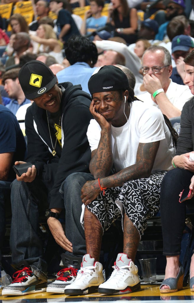 Celebrity Sneaker Watch: Lil' Wayne Wears "Fire Red" Air Jordan Retro V