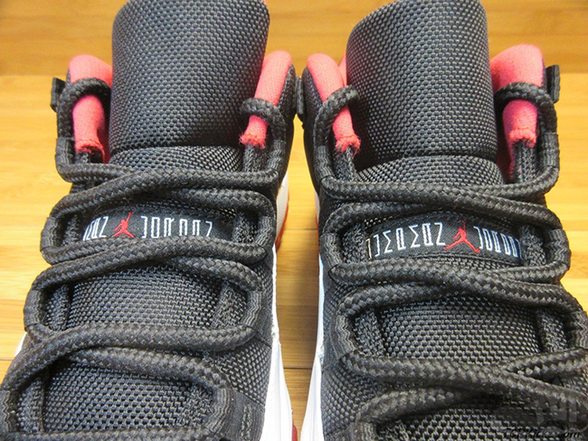Air Jordan 11 Low White Black Red Sample