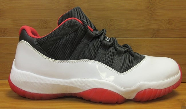 white black and red jordan 11