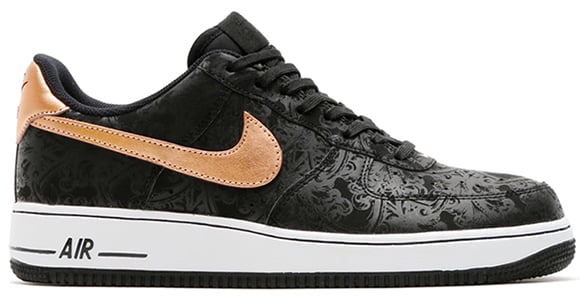 black and bronze nike shoes