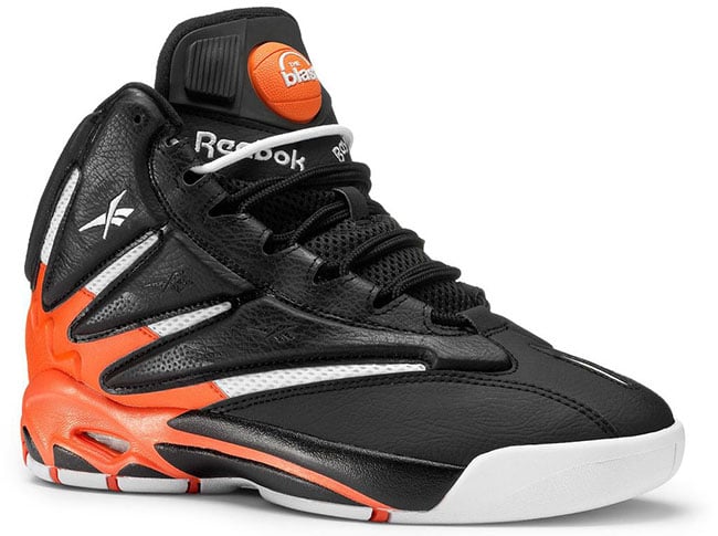 orange and black reebok