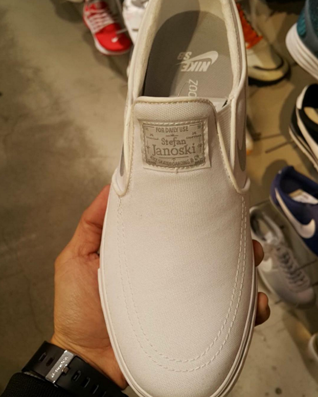 nike white slip on trainers