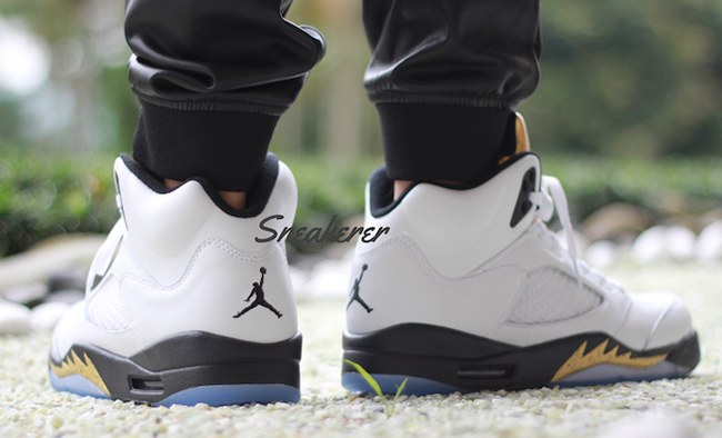 jordan 5 olympic gold on feet