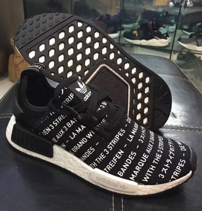 the brand with the three stripes nmd