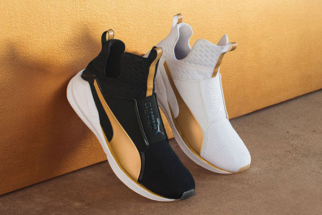 gold and white pumas with strap