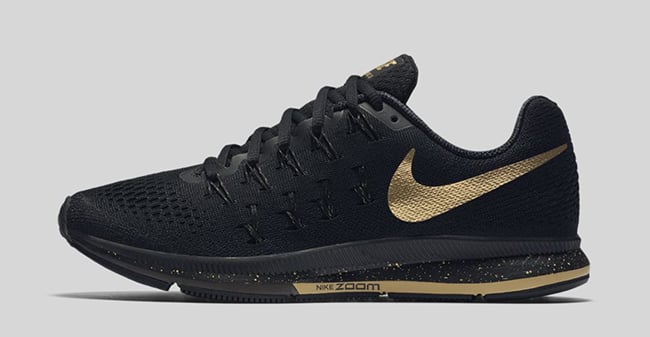 black nike shoes with gold nike sign