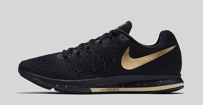 gold black nike shoes