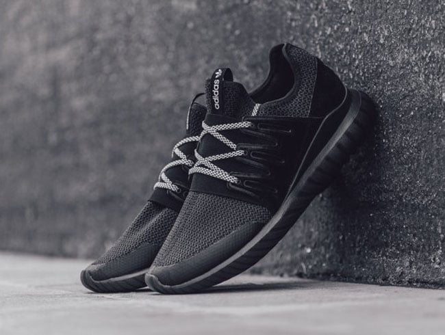 adidas tubular radial all black on feet