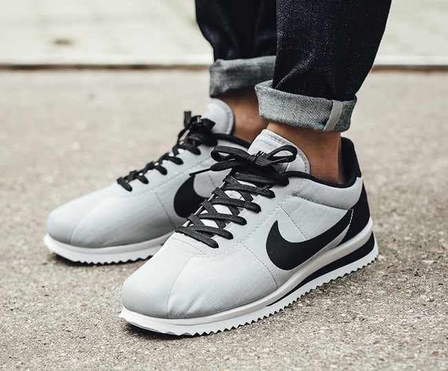 grey and black nike cortez