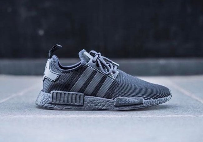 black nmds with chinese writing