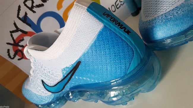 white and light blue vapormax