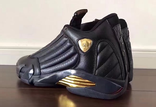 black and gold jordan 14s