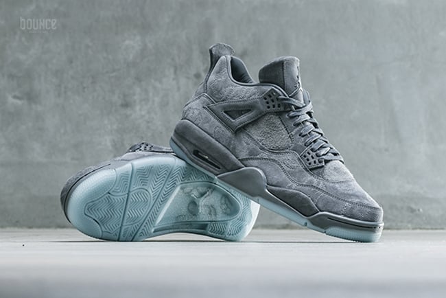 grey jordan 4 kaws