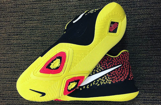 kyrie irving black and yellow shoes