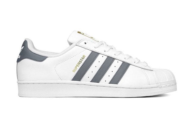 white adidas with grey stripes