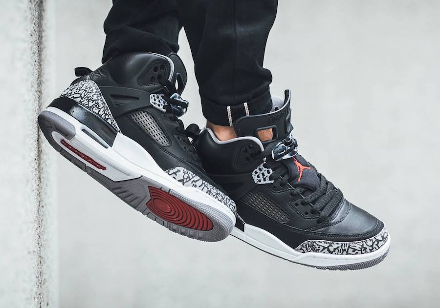 jordan 4 black cement on feet