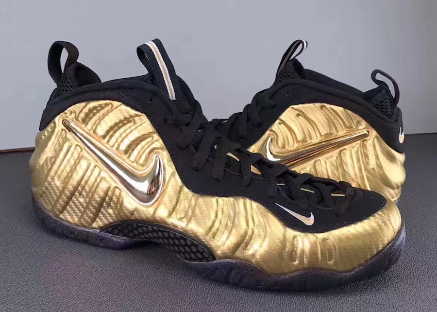 nike foamposite black gold