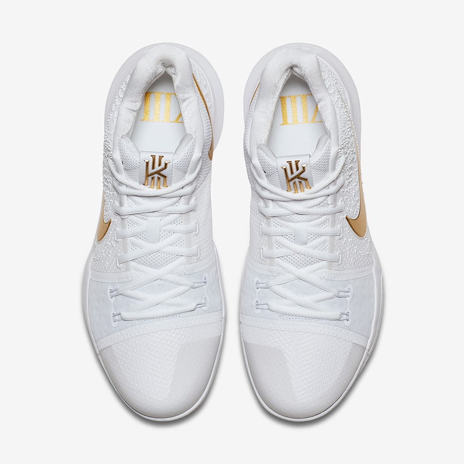 white nike shoes gold swoosh