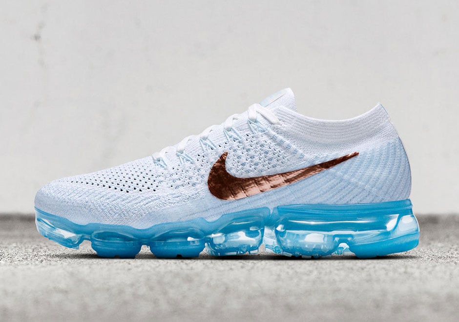 white and teal vapormax