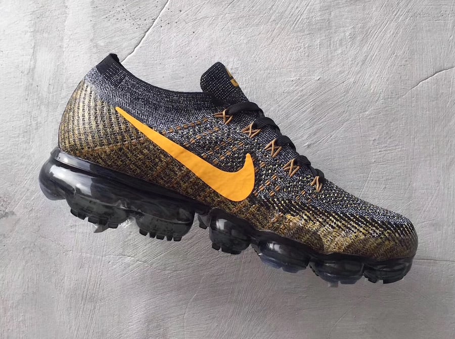 black and yellow nike vapormax