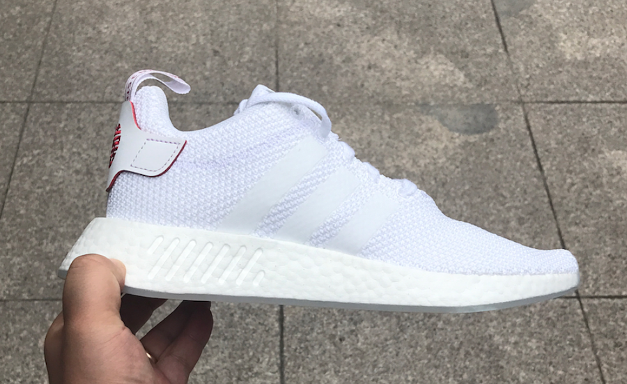white nmds with chinese writing