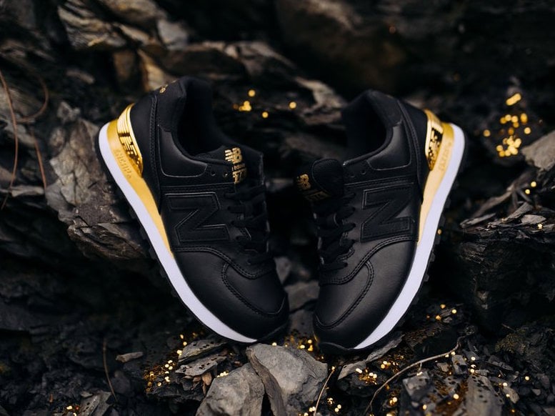 New Balance 574 in Black and Metallic Gold