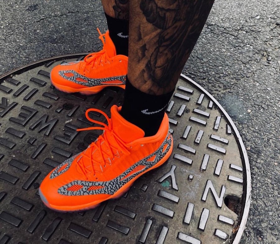 Air Jordan 11 Low IE Orange Elephant Print