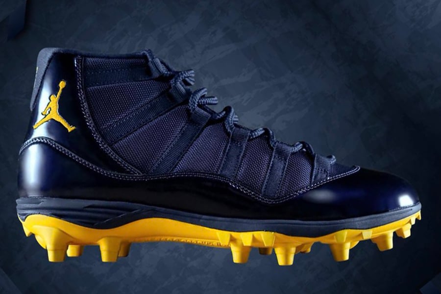 black and gold jordan cleats