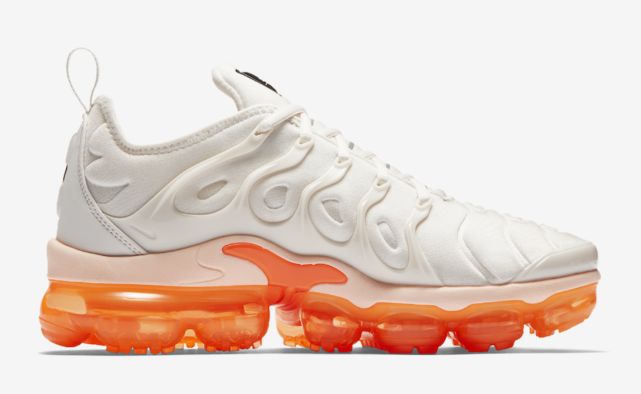 white vapormax with orange bottom