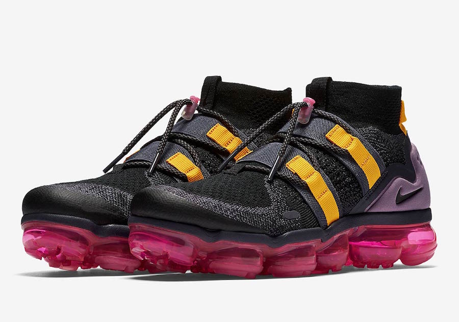 black vapormax with pink tick