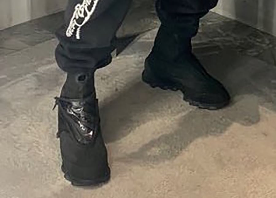 Kanye West in New All-Black Yeezy Boots