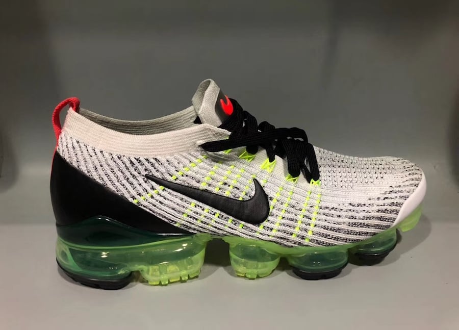 black white and lime green vapormax
