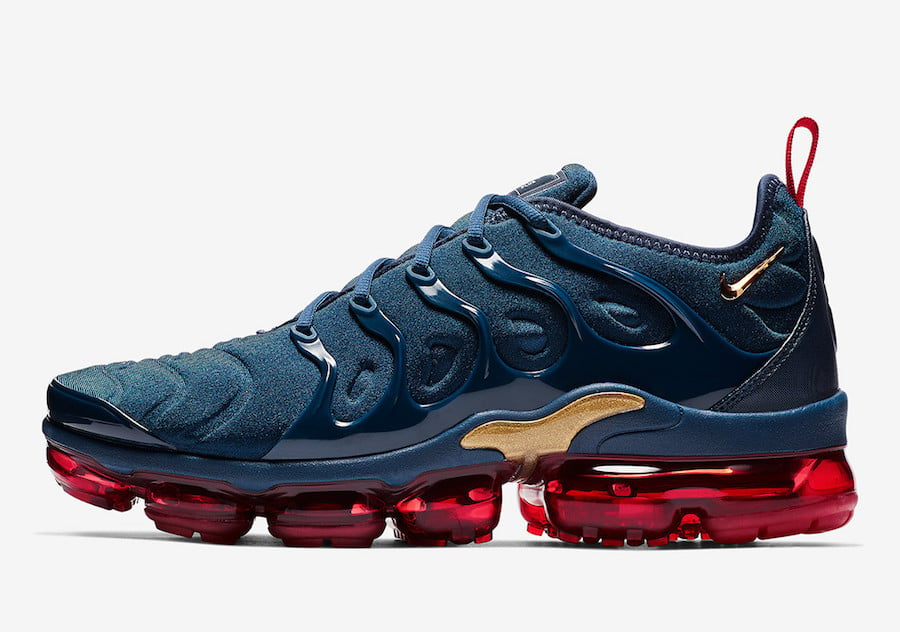 navy blue and red vapormax plus