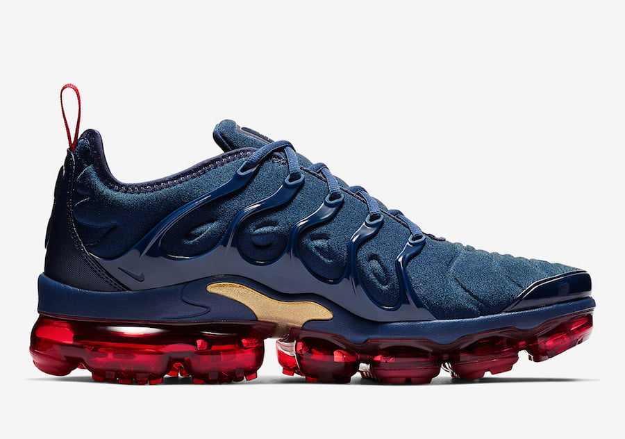 navy blue and red vapormax plus