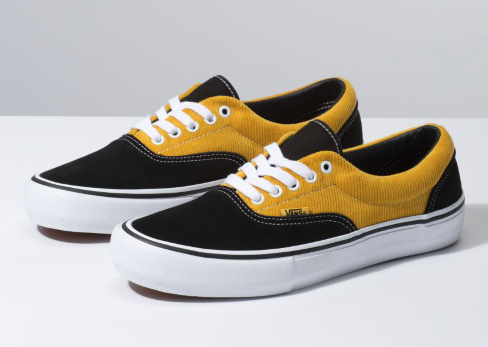 vans yellow corduroy slip on