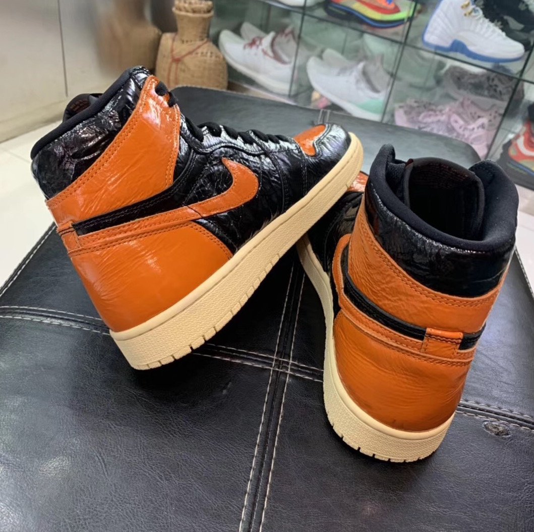 orange shiny jordan 1
