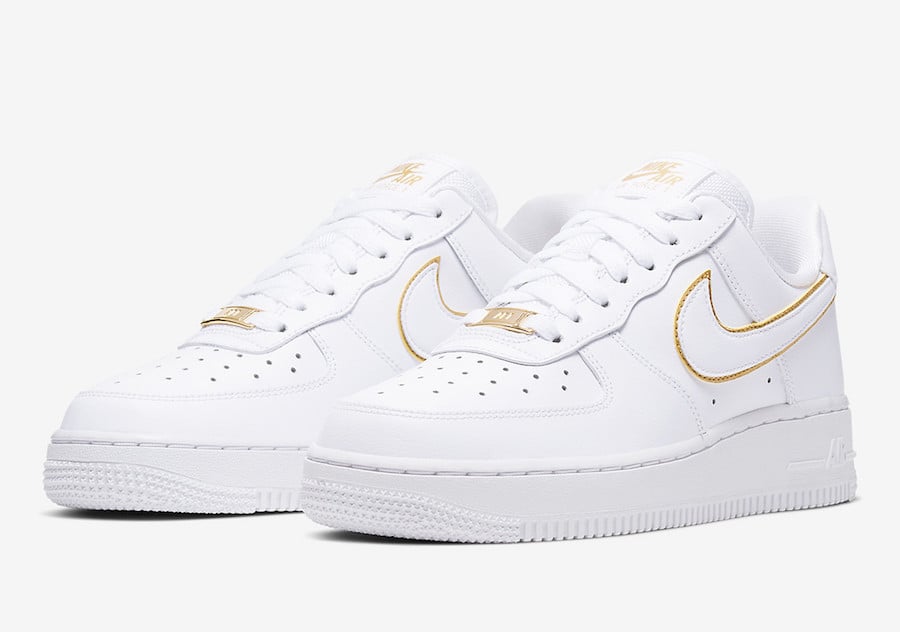 nike white shoes with gold tick